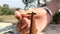 A male human hand igniting a dhoop insence stick hindu religion