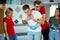 Male instructor show Heimlich Maneuver on patient