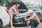 male insurance officer came to help inspect a customer\'s car that had an accident.