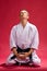 Male karate expert kneeling