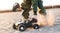 Male kid hands holding radio controlled wireless drive high speed sport car toy and joystick