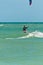 Male kiteboarding in the tropical gulf of Mexico