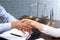 Male lawyer shaking hands with client at table