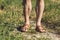 Male legs in brown leather sandals