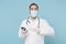 Male on-line doctor man in medical gown sterile face mask gloves isolated on blue background. Epidemic pandemic