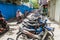 MALE, MALDIVES - JULY 11, 2016: Row of motorcycles in an alley in Male, Maldive