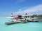 MALE, MALDIVES - JULY 14, 2017: Pilot preparing for a seaplane flight at Male seaplane terminal.