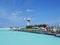 MALE, MALDIVES - JULY 14, 2017: Tourists preparing to get on a seaplane at Male seaplane terminal.