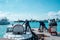 Male, Maldives - November 22, 2019: Hotel resort staff load guest luggage onto a speedboat for airport transfer to the resort