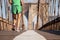 Male marathon runner running over Brooklyn Bridge
