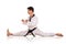 Male martial artist split sideways profile isolated