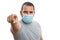Male with medical or surgical mask pointing index finger at screen