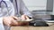 Male medicine doctor holding in hands bunch of dollars banknotes