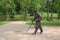 Male metal surveyor is installed in the Malpils Manor Park. Latvia, May 2019