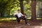 Male model sitting on a bench