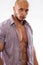 Male muscular model with open shirt on