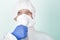 Male nurse with  face mask ffp2 dress up  protective coverall clothing