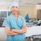 Male Nurse Standing In Hospital Ward