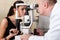 Male ophthalmologist conducting an eye examination