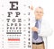 Male optician pointing to an eyesight test with a stick