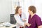 Male patients come to see a female doctor to check the illness or respiratory In the examination room