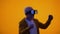 Male pensioner in virtual reality goggles playing videogame, modern technologies