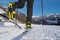 Male person cross-country skiing in beautiful winter landscape in mountains