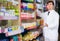 Male pharmacist posing in drugstore