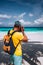 Male photograph making picture of paradise white sand tropical beach with turquoise blue ocean lagoon on vacation