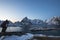 Male photographer captures a twilight landscape at the SakrisÃ¸y Rorbuer in Lofoten, Norway