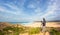 Male photographer traveling and photography in the dunes.