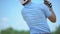 Male playing golf, suddenly feeling spasm in neck, sports trauma result, health