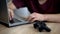 Male playing video games, joystick lying on table near laptop, gaming addiction