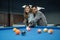 male pool player guide the female player to poke the cue ball