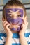 Male Primary School Pupil Cutting Out Paper Shapes