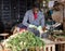 Male professional gardener sorting harvest of onion