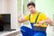 The male professional serviceman repairing tv at home