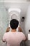 Male puke on toilet shoot