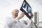 Male Radiologist Analyzing Chest X-ray In Examination Room