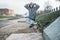 Male rapper posing on the street, urban dancing