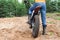 Male rider on motorcycle rides the sand. Extreme sports on motorcross motorcycles