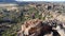 Male rock climber standing over a rocky mountain 4k