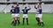 Male rugby players celebrating goal in ground at stadium 4k