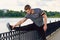 Male runner doing stretching exercise, preparing for workout in