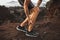Male runner holding injured calf muscle with pain