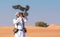 Male saker falcon during a falconry flight show in Dubai, UAE.