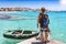 Male scuba diver enjoys the view over the turquoise waters of the Aegean Sea