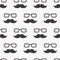 Male seamless pattern, gentlemens print with mustaches and glasses on polka dot background, wrapping paper. Black and white design
