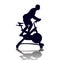 Male silhouette on exercycle in spinning class