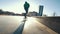 Male skateboarder riding on the track on the city street